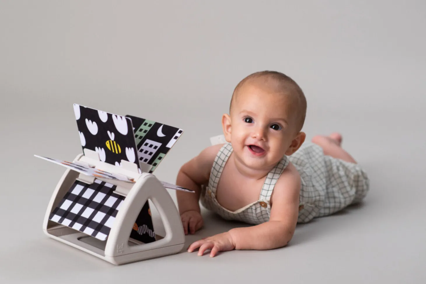 Obracająca się książeczka grzechocząca Tummy Time