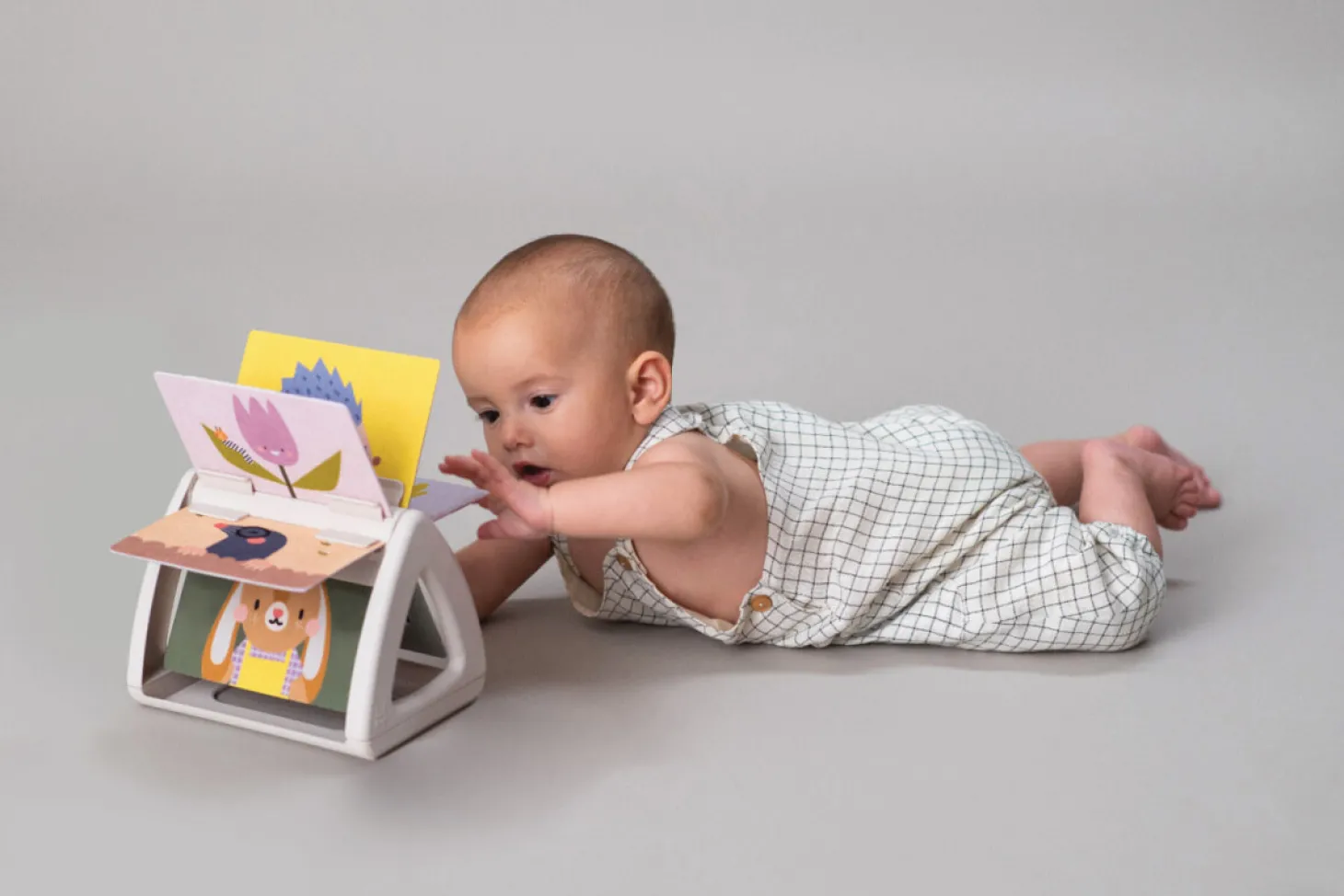 Obracająca się książeczka grzechocząca Tummy Time