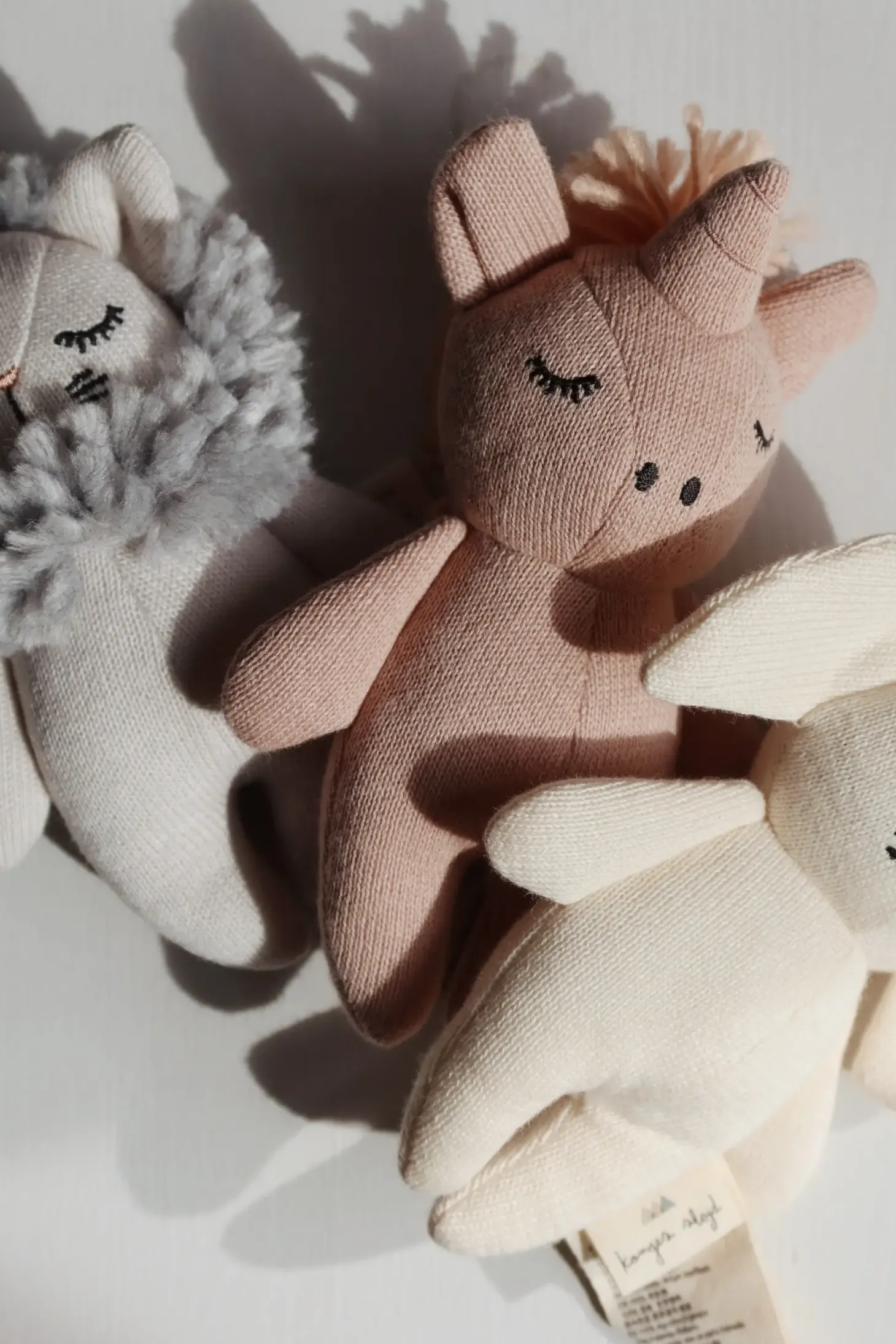 Przytulanka sensoryczna Mini Jednorożec - rose swan