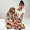 Pudełko 25 niespodzianek z dinozaurami