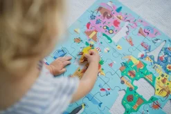 Puzzle Mapa Świata z elementami w kształcie budynków i zwierząt 5+
