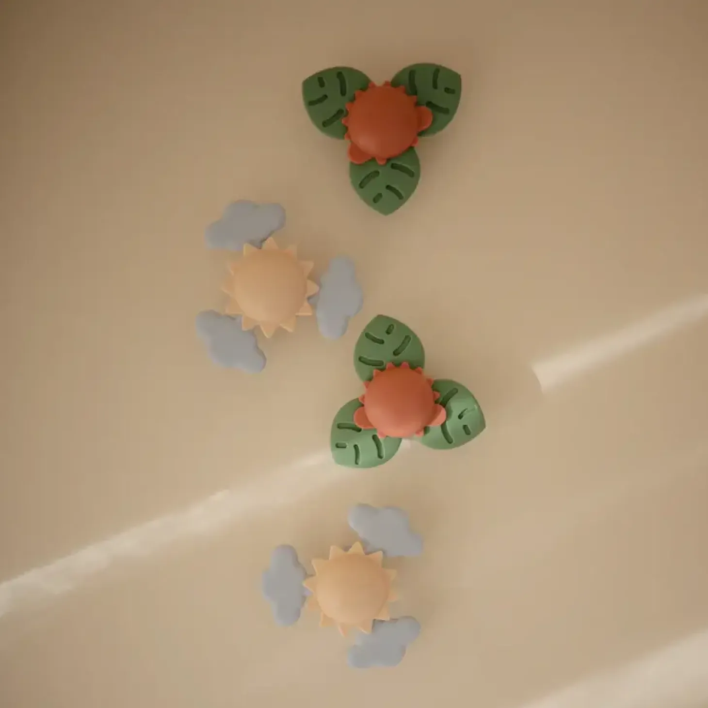 Spinner sensoryczny z przyssawką - Dino