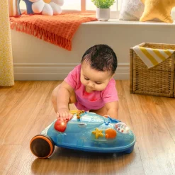 Walk 'n’ Play– muzyczny chodzik-pchacz z odpinanym panelem interaktywnym